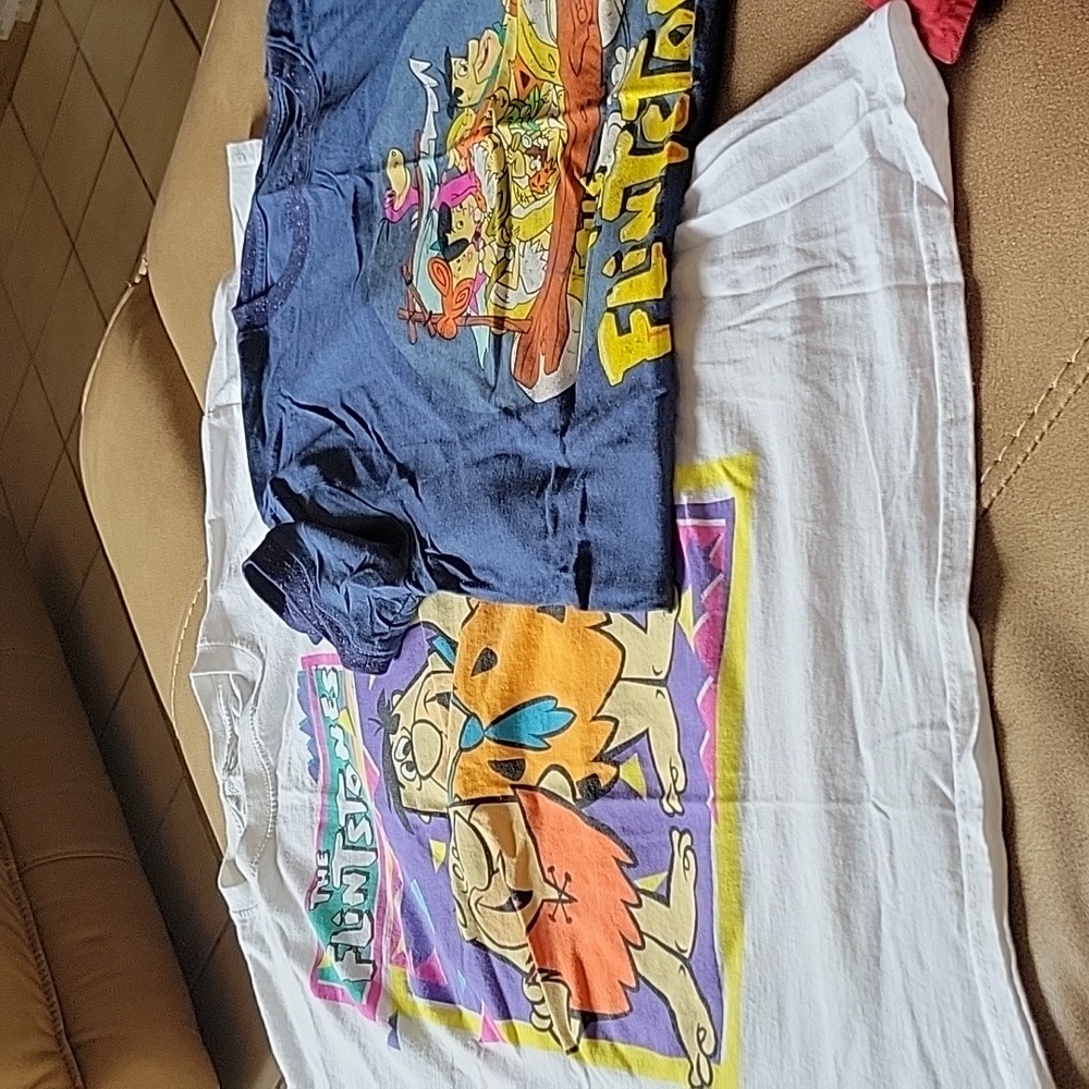 I'm selling 2 Flintstones t shirts.